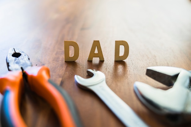 Wooden surface with tools for father's day