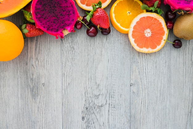 Wooden surface with variety of fruits