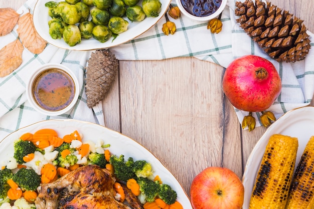 Wooden table covered with food