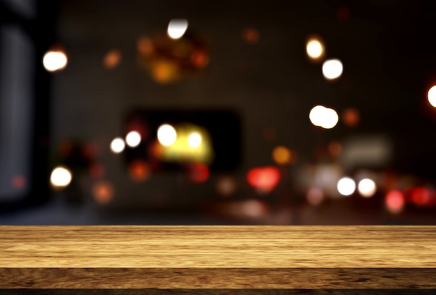 wooden table looking out to a defocussed room interior