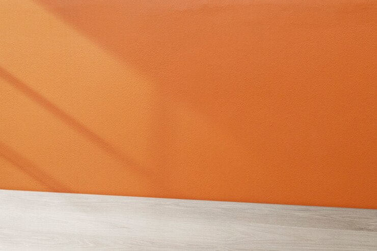 Free Photo wooden table product backdrop, orange wall design