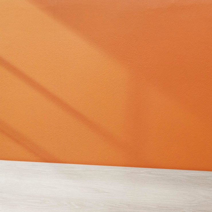 Free Photo wooden table product backdrop, orange wall design