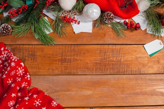 The wooden table with Christmas decorations with copy space for text. Christmas mockup concept