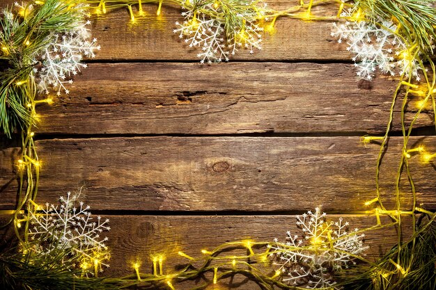 Free photo the wooden table with christmas decorations with copy space for text. christmas mockup concept