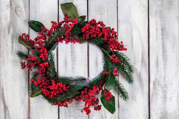 Free photo wooden table with christmas decorations with copy space for text.