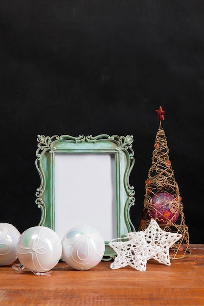 Free photo the wooden table with christmas decorations