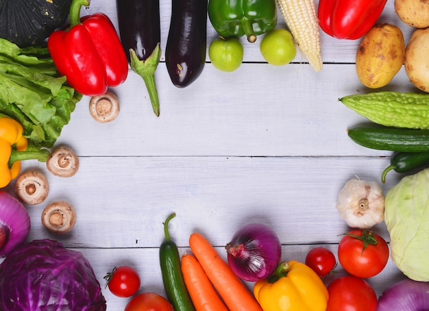 Wooden table with vegetables