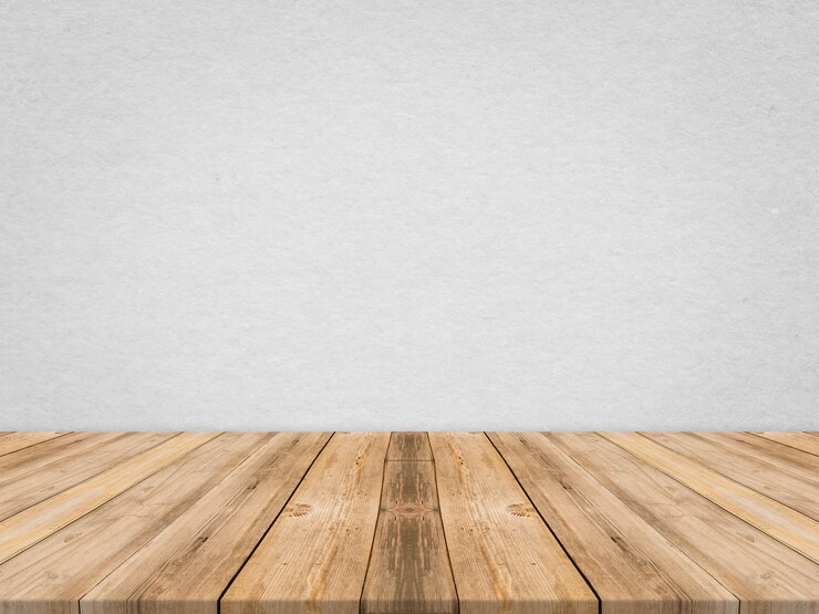 Free Photo wooden tabletop at tropical paper texture wall,template mock up for display of product,business presentation.