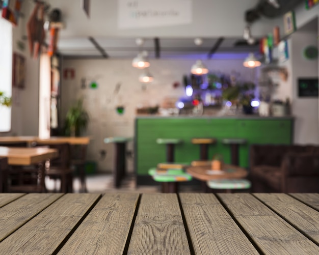 Free photo wooden texture looking out to empty bar