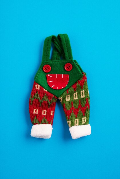 Woolen decorative Christmas overall in the blue background