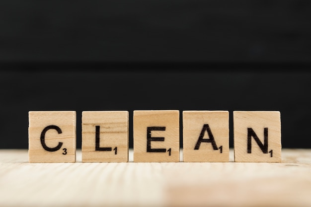 The word clean spelt with wooden letters