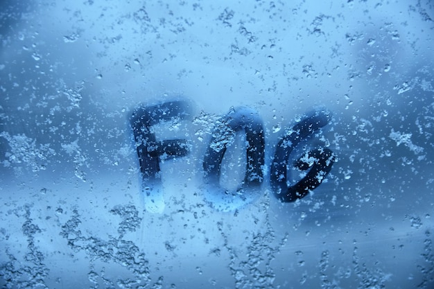 "Word Fog on frozen window"