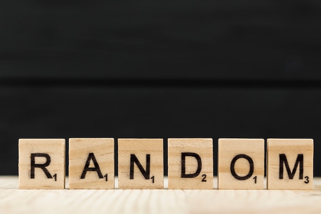 The word random spelt with wooden letters