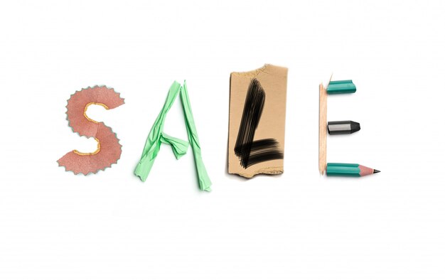 The word sale created from office stationery.