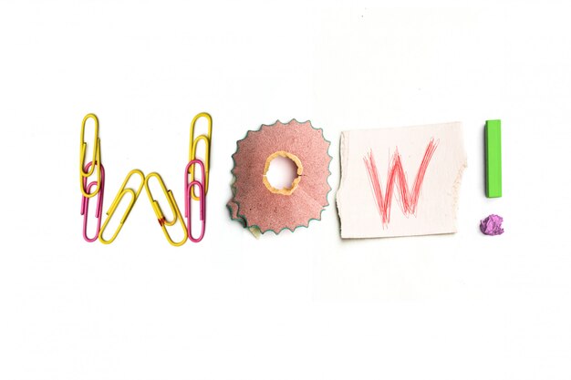 The word wow created from office stationery.