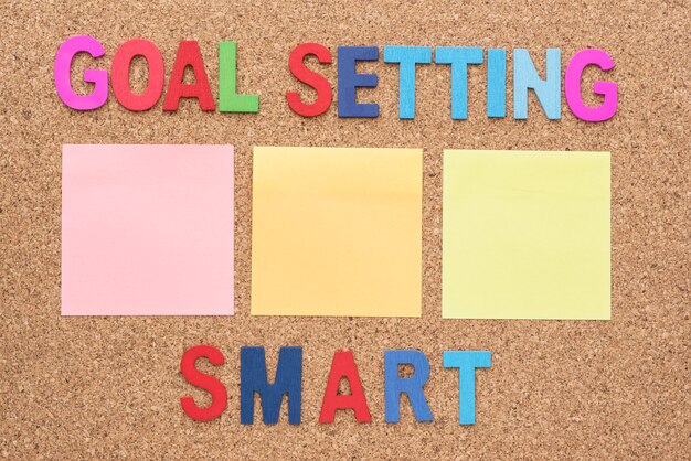 Words goal setting and smart with blank notepad
