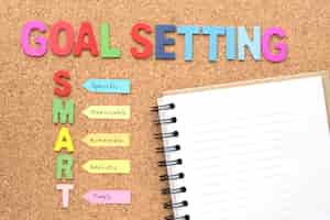 Free photo words goal setting and smart with notebook