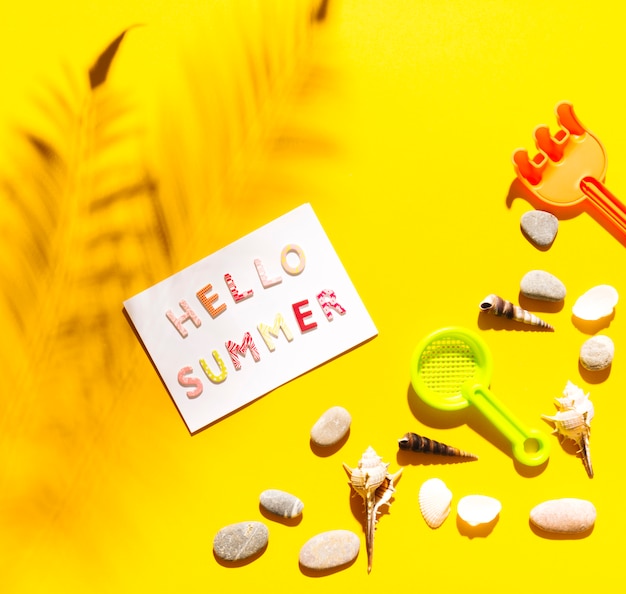 Free photo words hello summer on paper