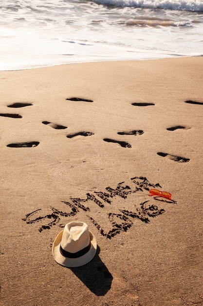 Free photo words in the sand about summer