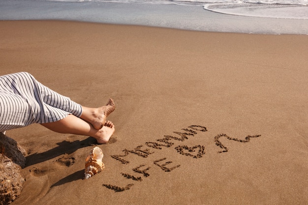 Free photo words in the sand about summer