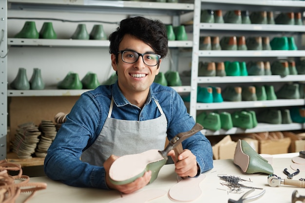 Free photo work of footwear repairman