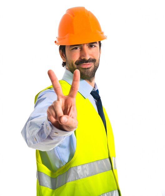 worker doing victory gesture