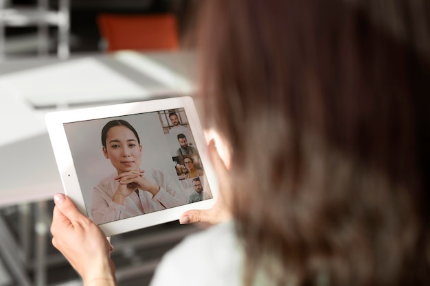 Worker holding tablet close up