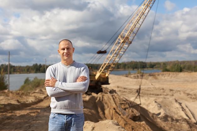 worker  at sand pit