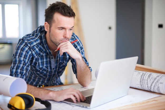 Worker using a laptop in the office