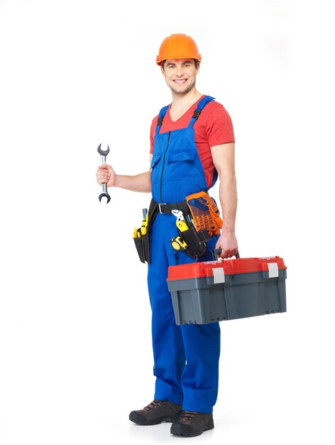 Worker with tools full portrait over white background