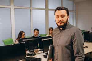 Free photo workers at an it company working on a computer