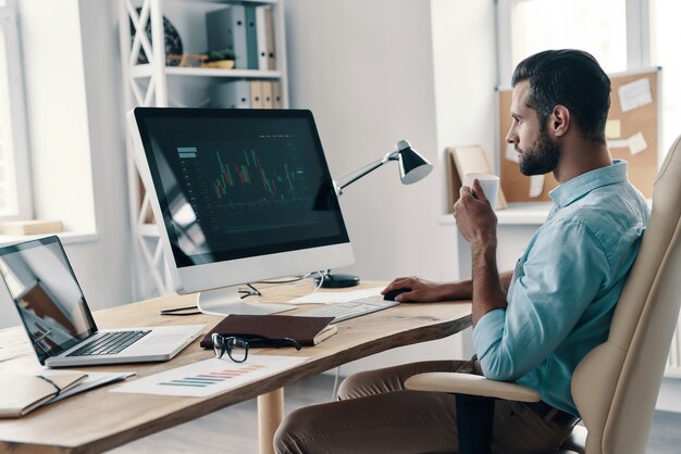 Premium Photo | Working day. young modern businessman ... Premium Photo | Working day. young modern businessman ...