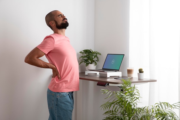 Free photo working from home in ergonomic workstation