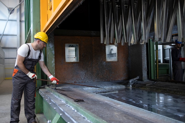 Free photo working in metal processing factory