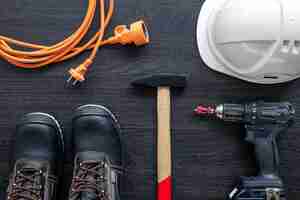 Free photo working tools and things of a worker builder or electrician top view