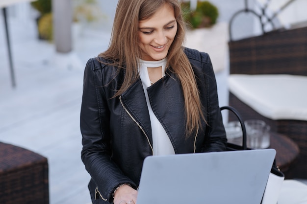 Working woman looking at a laptop