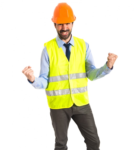 workman doing victory gesture