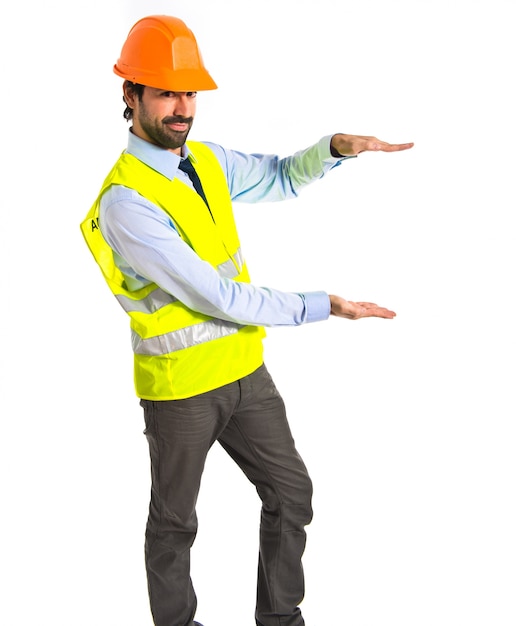 workman holding something over white background