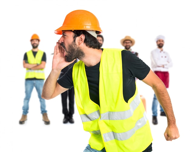 Workman shouting over isolated white background