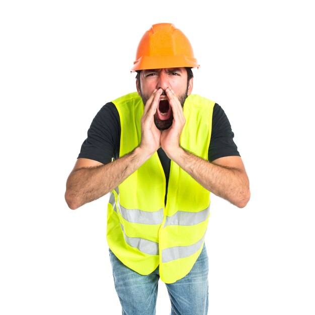 Workman shouting over isolated white background