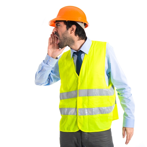 Workman shouting over white background