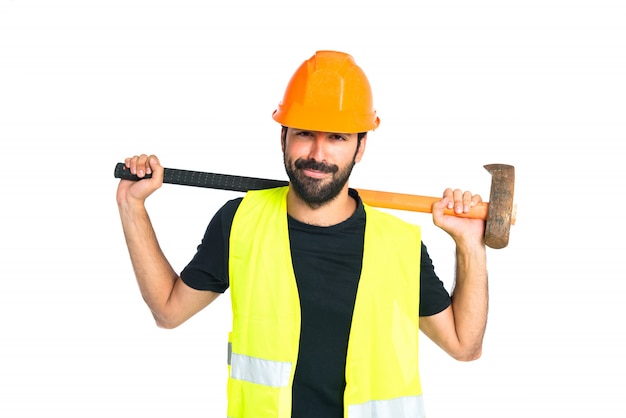 Workman with ax over white background