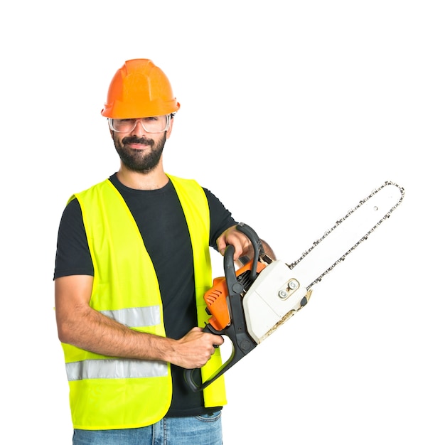 Free photo workman with chainsaw over white background