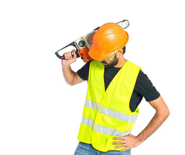 Workman with chainsaw over white background