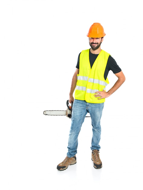 Workman with chainsaw over white background