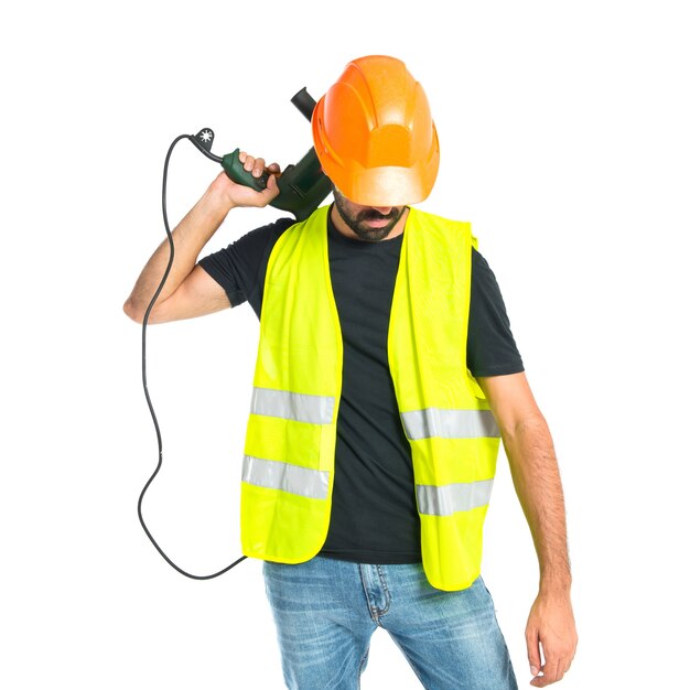 workman with drill over white background