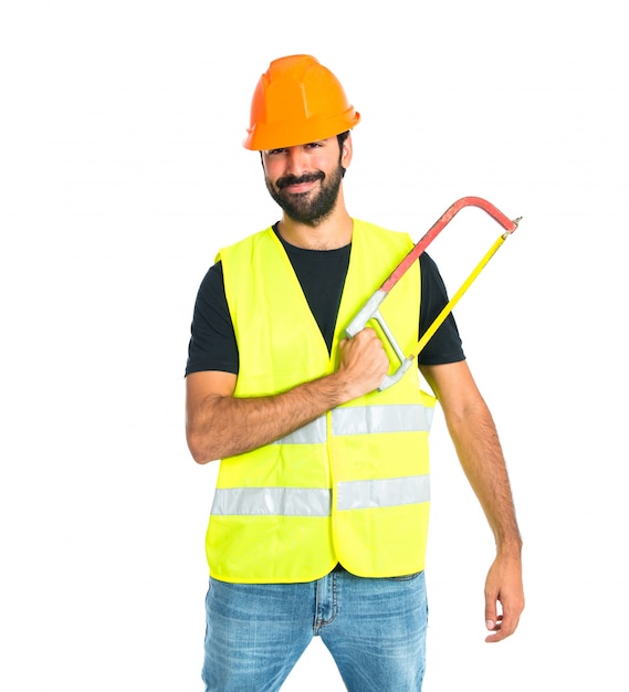 Free photo workman with hacksaw over white background