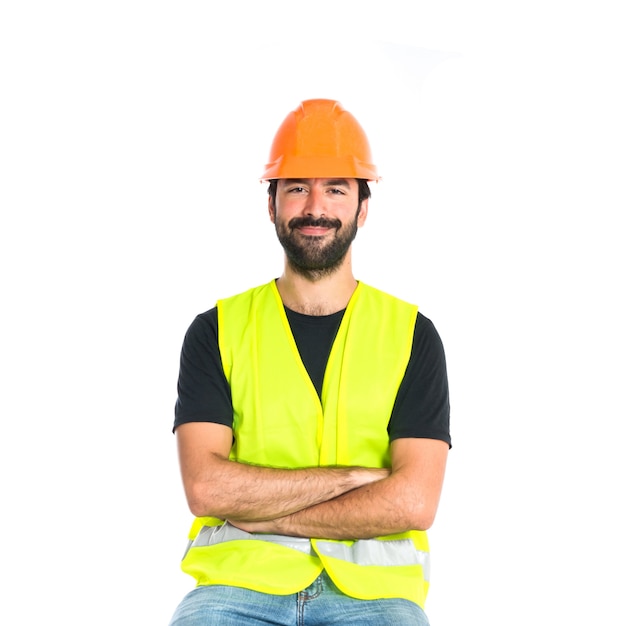 Free photo workman with his arms crossed over white background