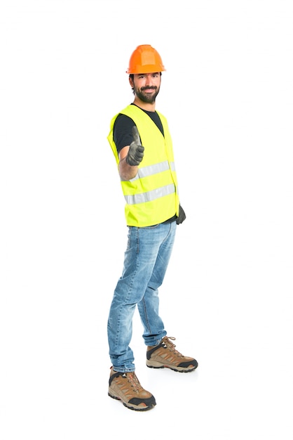 Workman with thumb up over white background