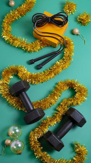 Free photo workout equipment with christmas theme and decorations